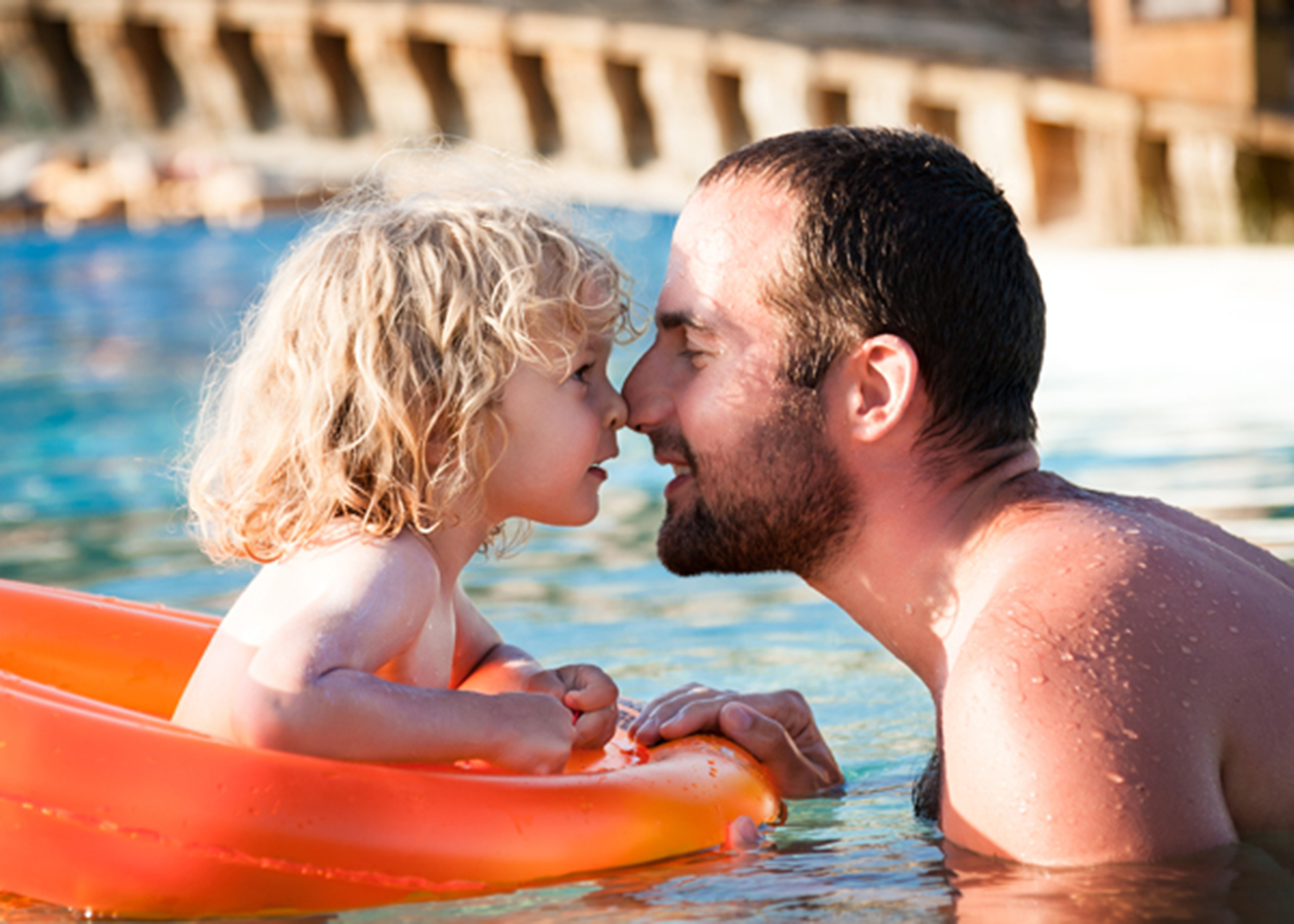 dad and dau in pool