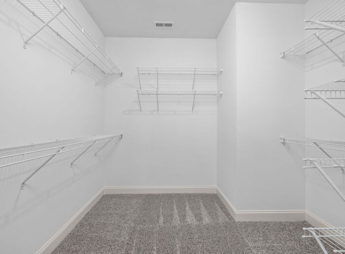 Oversized walk in closet, space for storage