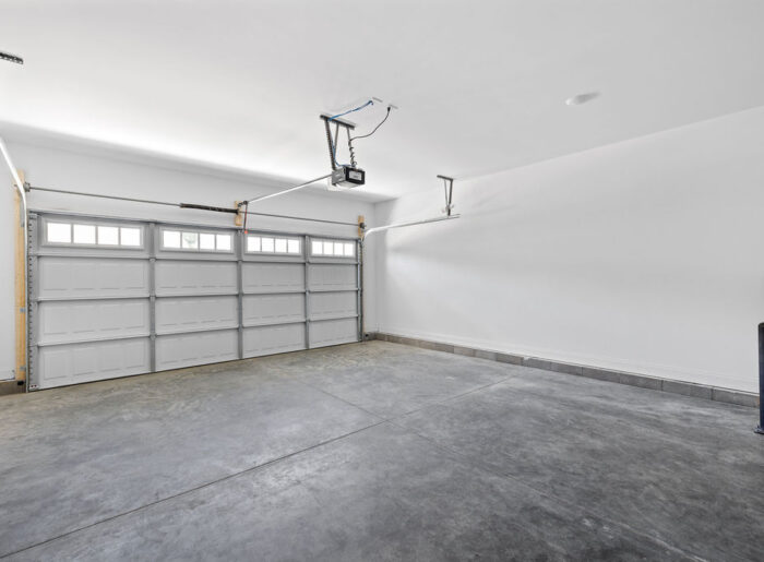 Two car garage in brand new single level townhome