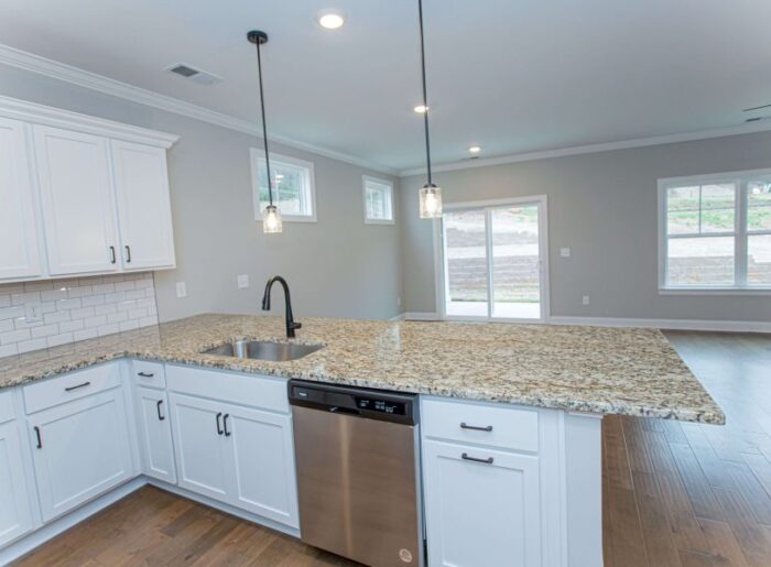 Designer kitchen in move-in ready townhome