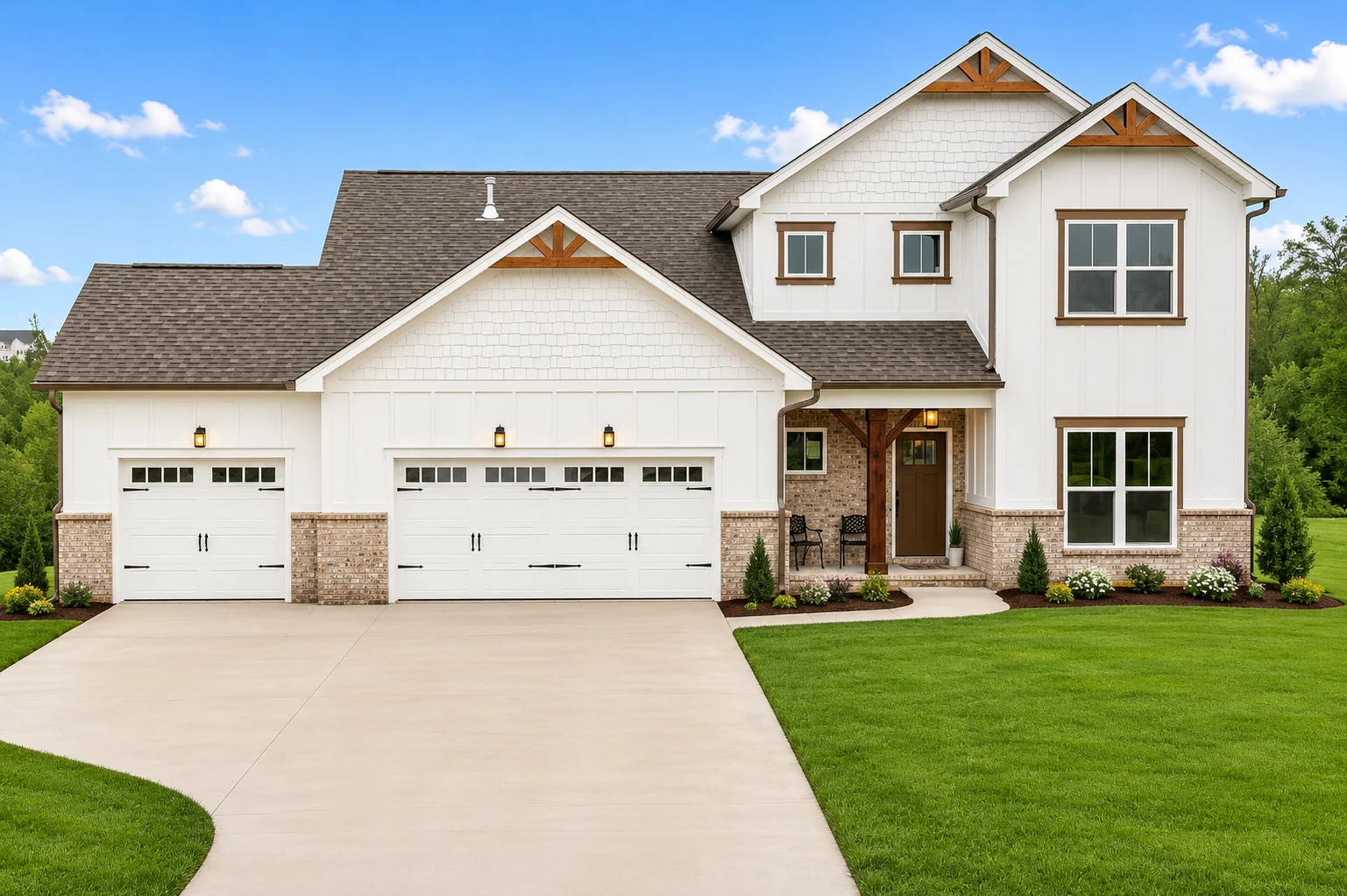 Modern two-story home with white siding, gray roof, and a double garage, by Pratt Home Builders in Chattanooga TN. Lush green lawn in front.