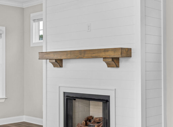 Fireplace in quick move-in designer home 4 bedrooms, 3.5 bath and 3 car garage