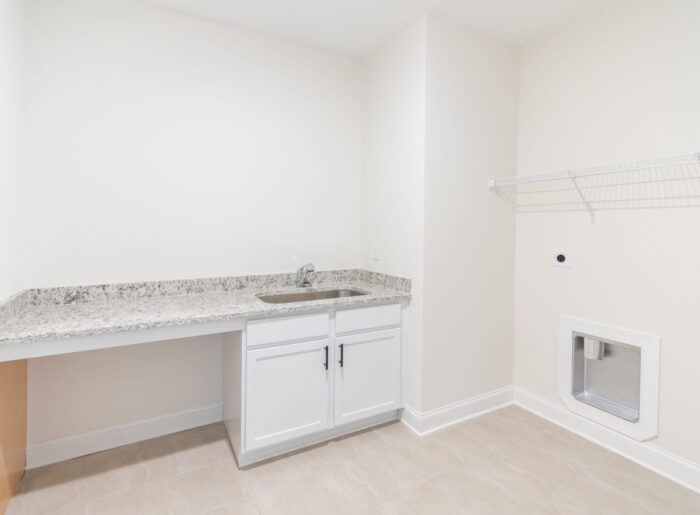 Mudroom with laundry folding space