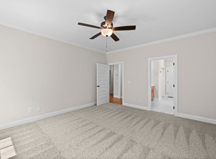 Primary Suite with spacious design and large windows
