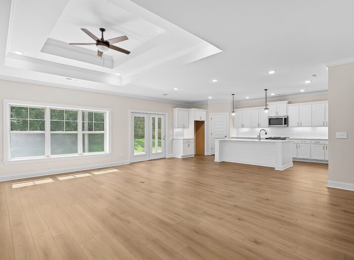 Open floor plan to gourmet kitchen in new construction Pratt home
