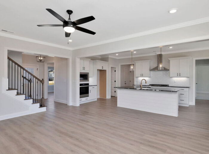 Open floor plan with large chef's kitchen move-in ready