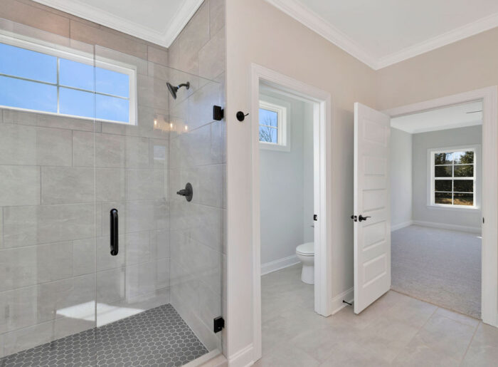Primary bathroom with stunning finishes throughout this new construction single family home