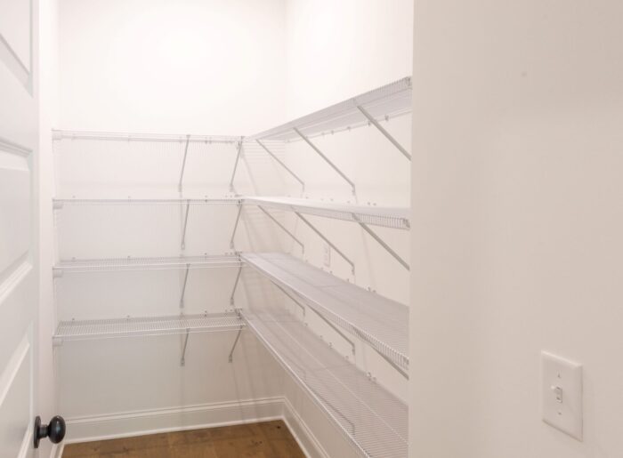 Large walk in closet for extra storage in primary suite