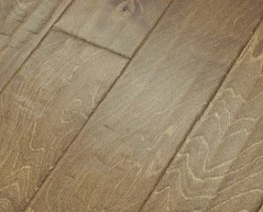 Smooth, light brown wood flooring with natural grain patterns, ideal for modern designs by Pratt Home Builders in Chattanooga TN.